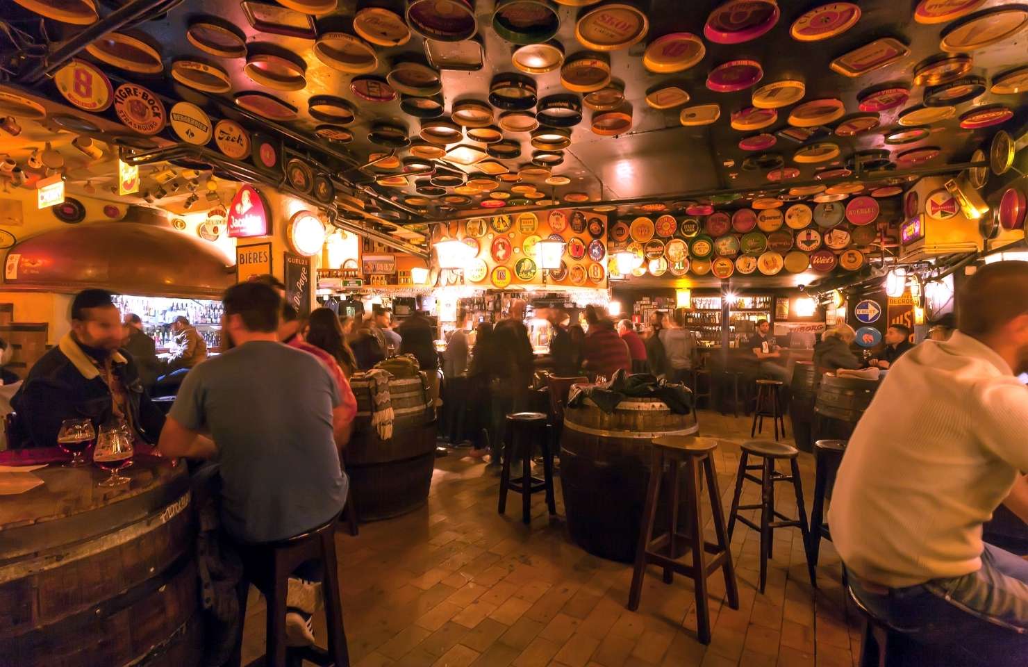 one of the best secret bars in Lisbon filled with people at night