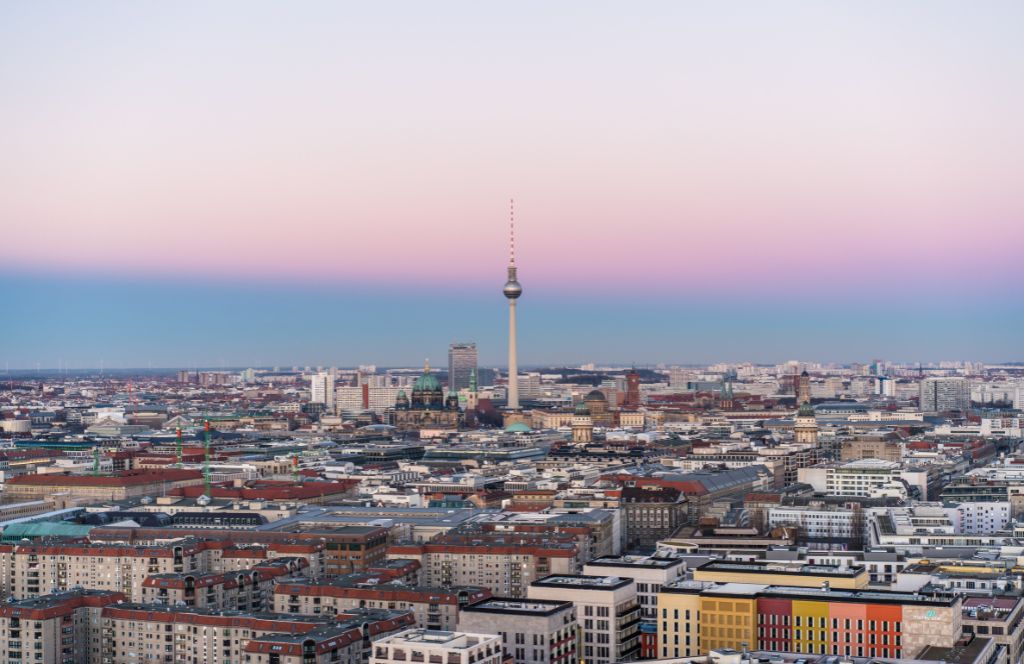 the berlin tv tower among the rooftops