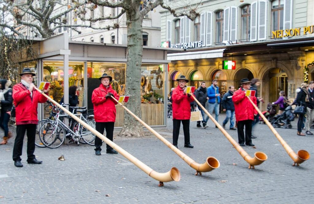 men blowing pipes in geneva- one of the most unique christmas destinations