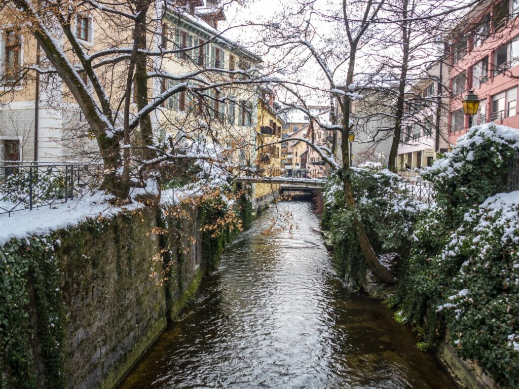 canals in annecy covered in snow during Christmas in france