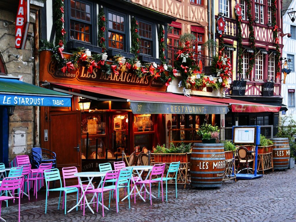 a street in rouen with christmas decorations during christmas in france