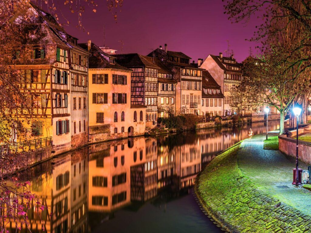 traditional french houses on a canal in strasbourg - one of the best places to celebrate christmas in france