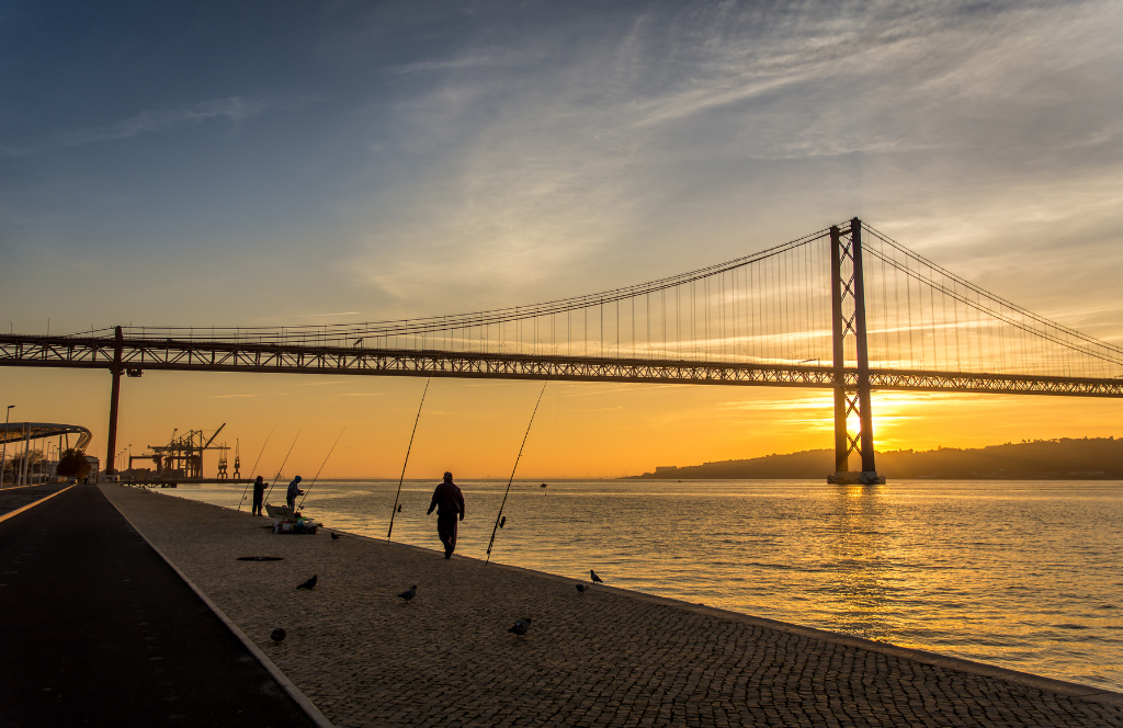 the tagus river at sunset in lisbon
