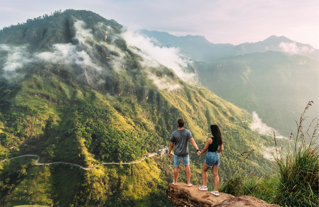 a couple explore the jungle during their luxury honeymoon