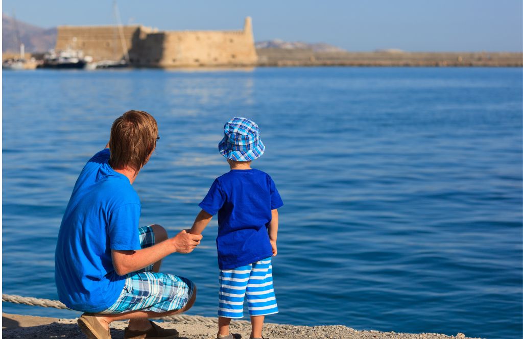 a man and son on a greece family vacation in summer 2024 in crete