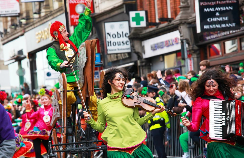 people celebrating st paddys day in the festival quarter dublin