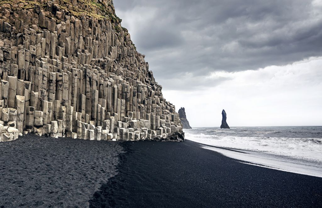 visit the black sand beach in iceland during your weekend getaway