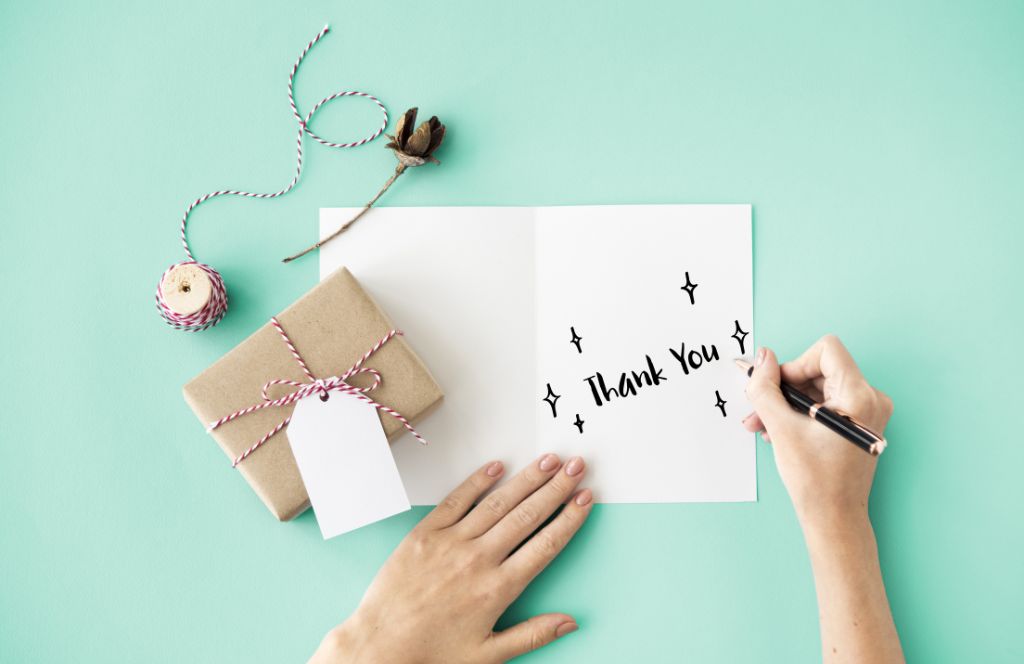 write a thank you card as part of your thank you hamper
