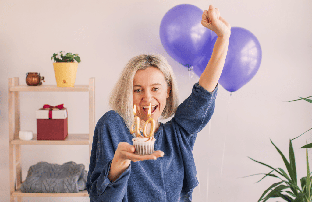 a lady on her 40th birthday with a special 40th birthday present for her