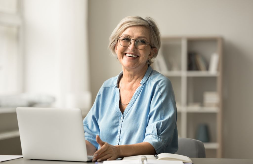 a woman is delighted with her retirement gift
