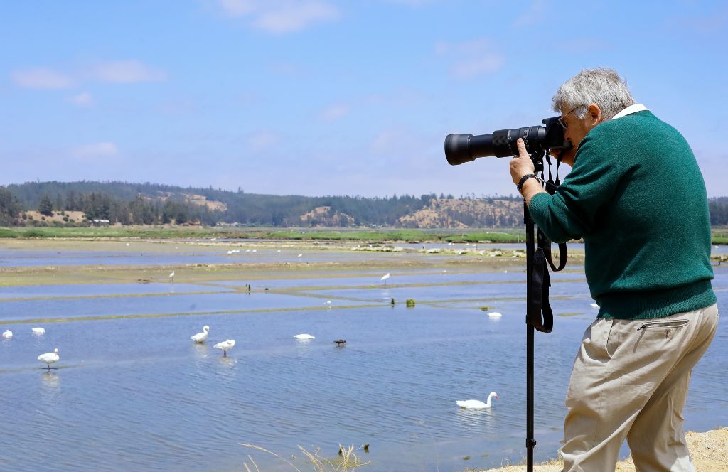 a man with a camera - one of the best gift ideas for 70th birthday