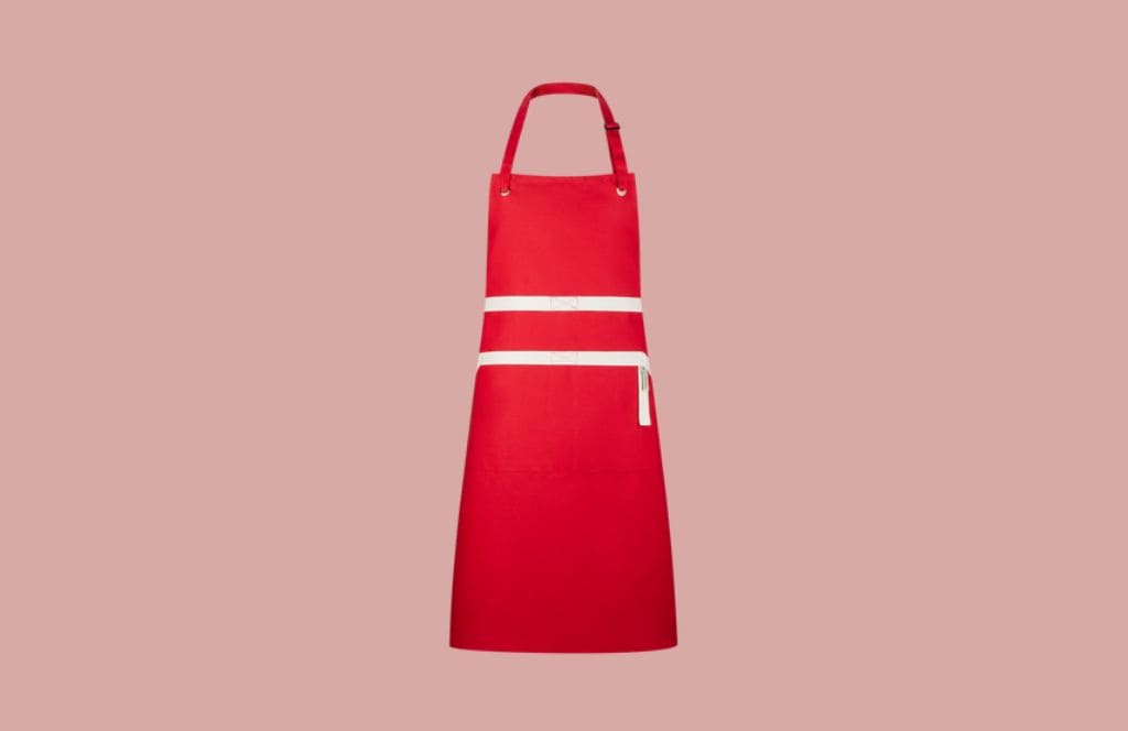 le creuset chef apron is one of the best 40th birthday gifts for women who love cooking