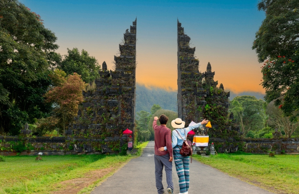 A couple in front of a temple in Bali Best places to visit in september