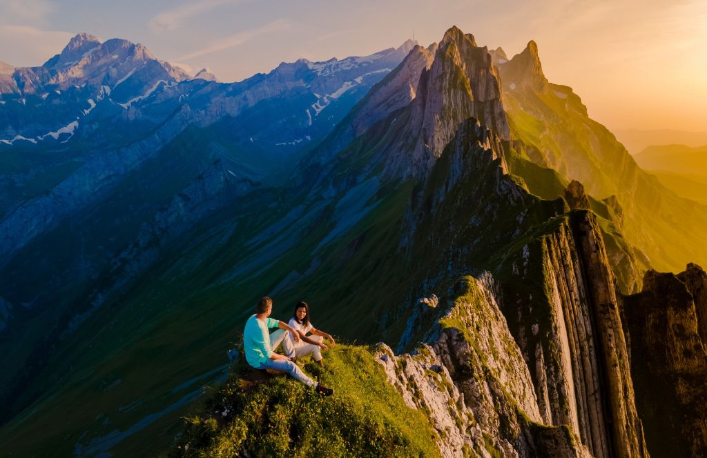 people on a mountain in switzerland