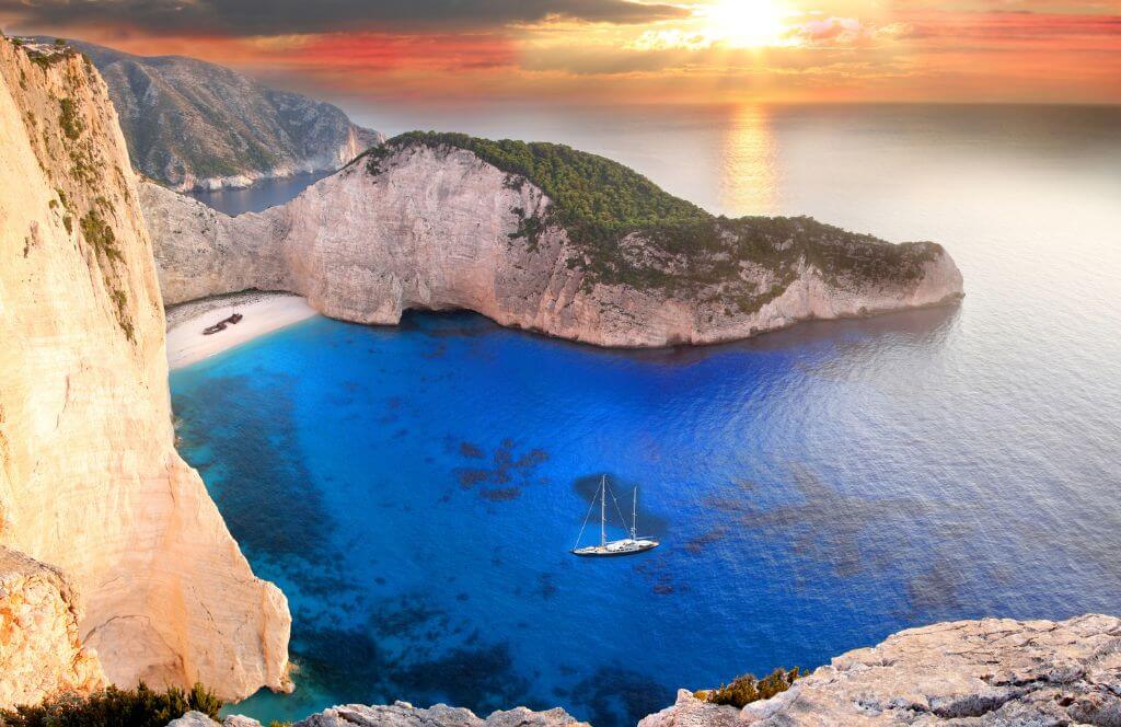 Navagio beach with sailboat in Zakynthos Island, Greece, part of the Ionian Islands