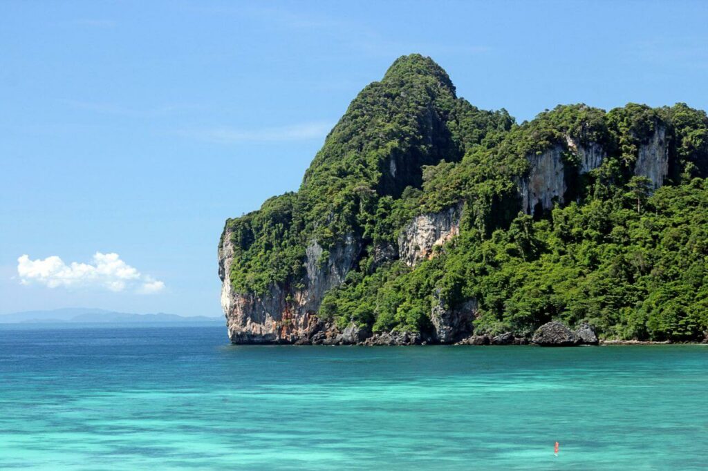 view of tropical cliffs and turquoise waters in Krabi, Thailand