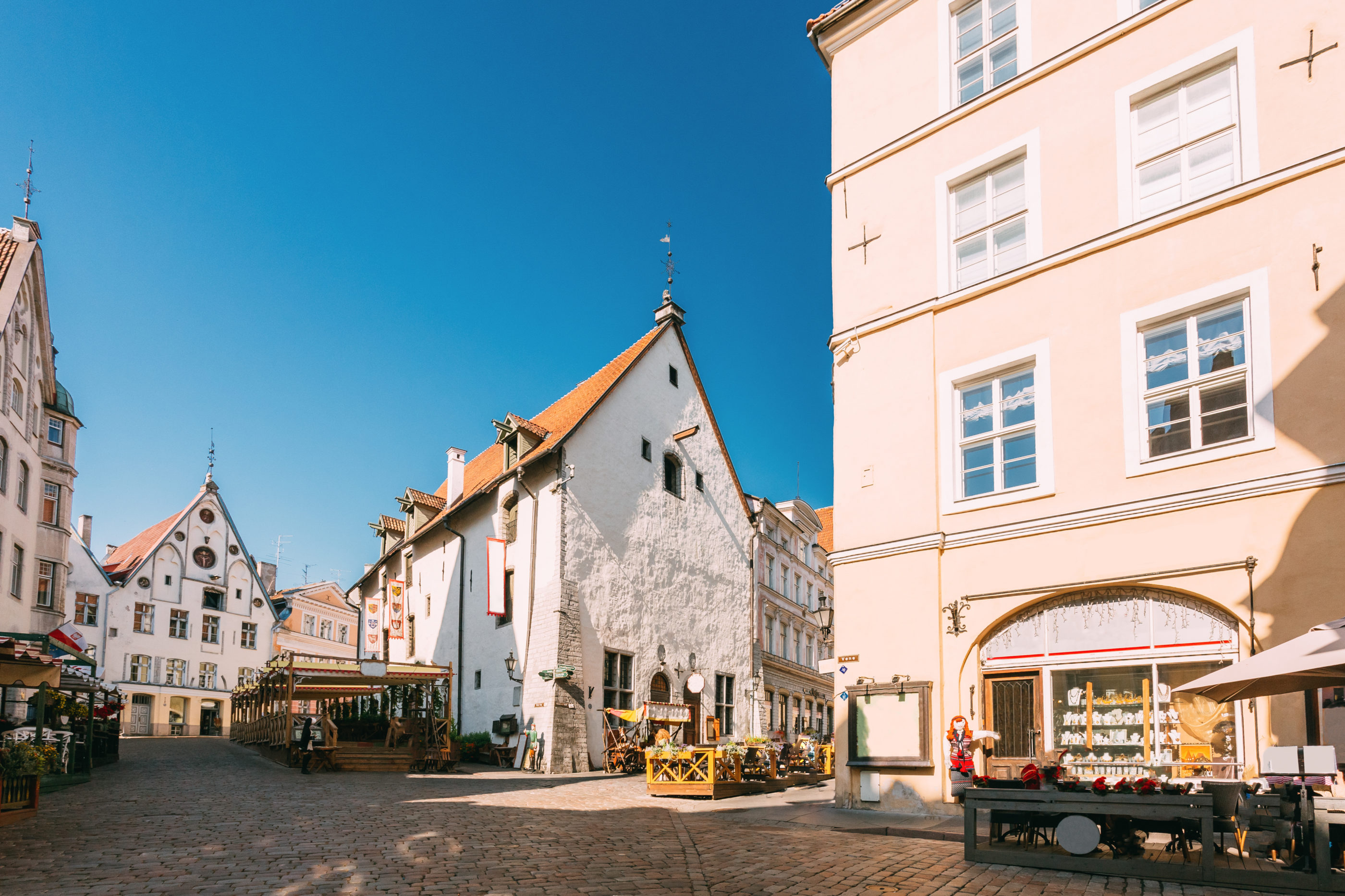 Tallinn Estonia People Resting In Street Cafe Restaurant In Old